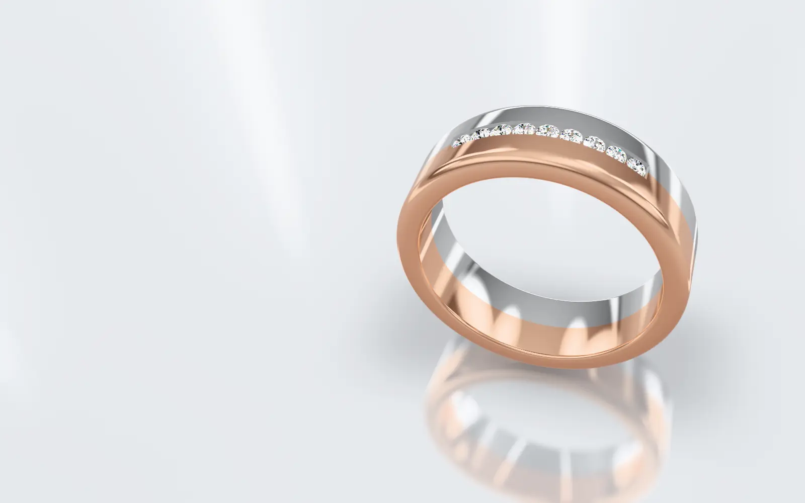Der Ring mit einer Reihe Brillanten im Kanal auf der Außenseite