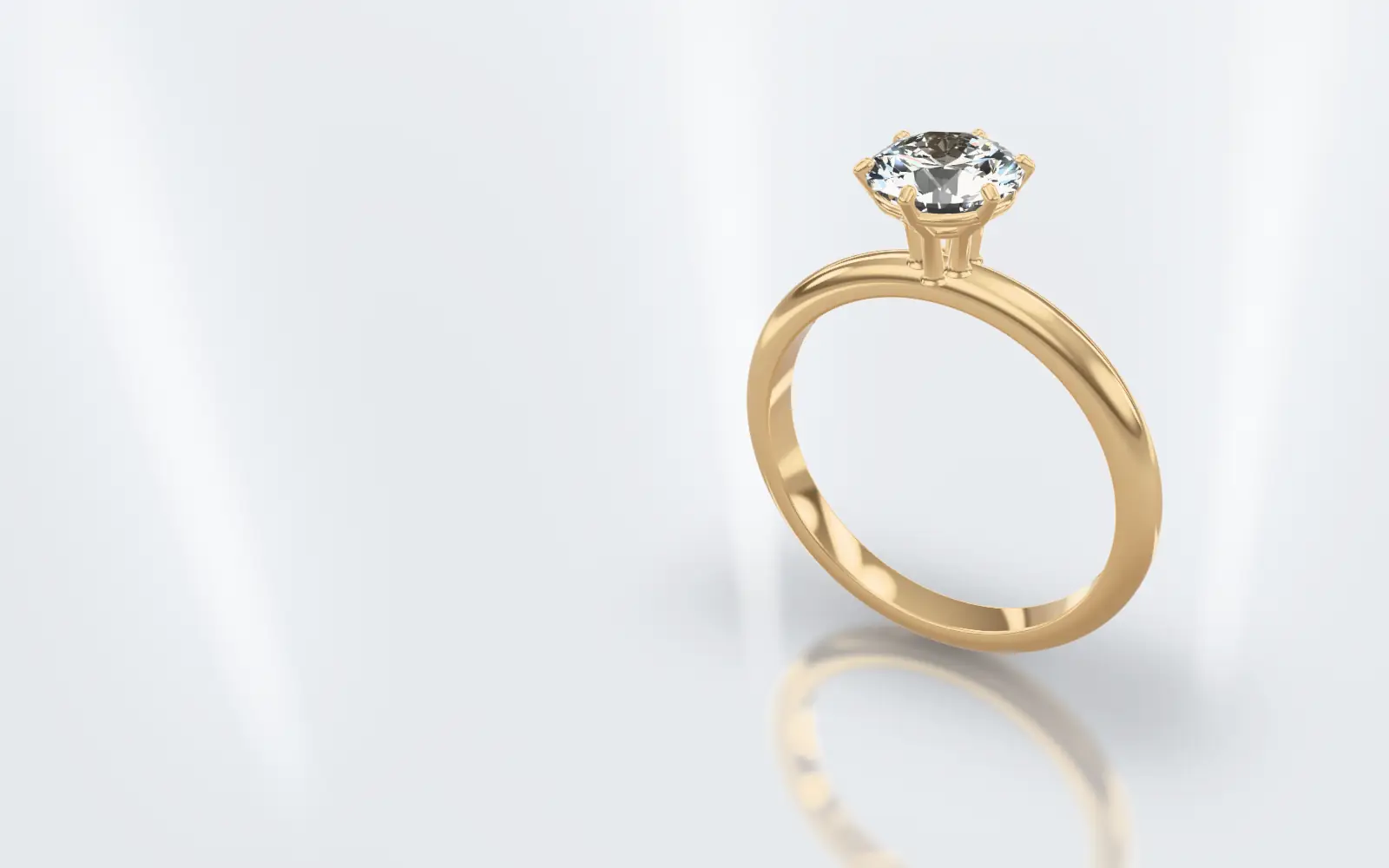Verlobungsring in Gelbgold mit einem Brillanten in sechs Krappen, schräg von oben