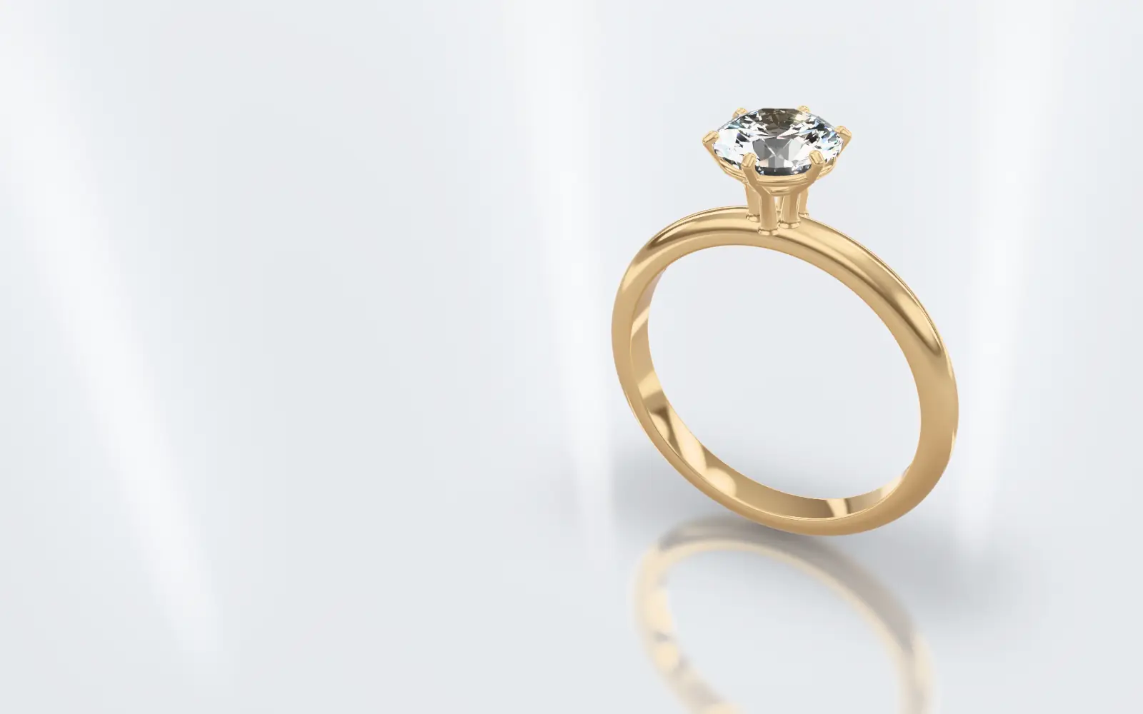 Verlobungsring in Gelbgold mit einem Brillanten in sechs Krappen, schräg von oben